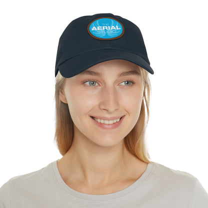 Aerial Studio Round Leather Patch Hat | White dad cap with blue logo