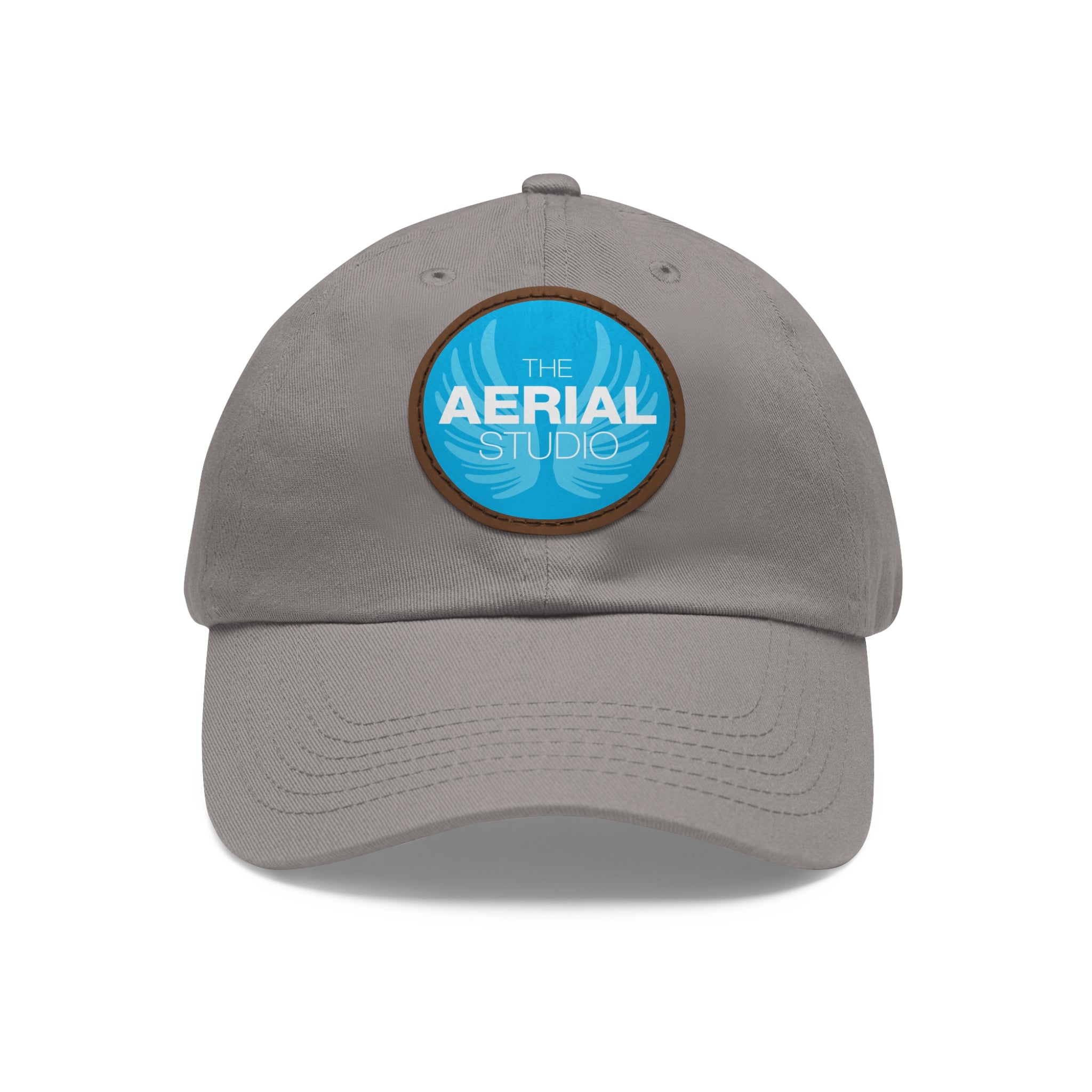 Aerial Studio Round Leather Patch Hat | White dad cap with blue logo