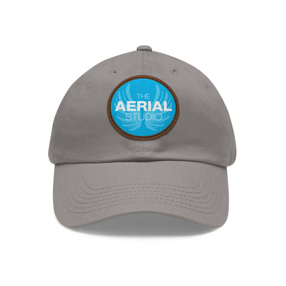Aerial Studio Round Leather Patch Hat | White dad cap with blue logo