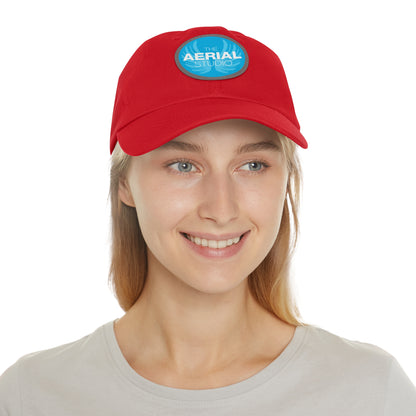Aerial Studio Round Leather Patch Hat | White dad cap with blue logo