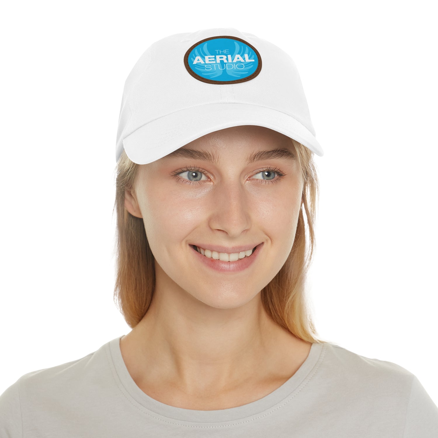 Aerial Studio Round Leather Patch Hat | White dad cap with blue logo
